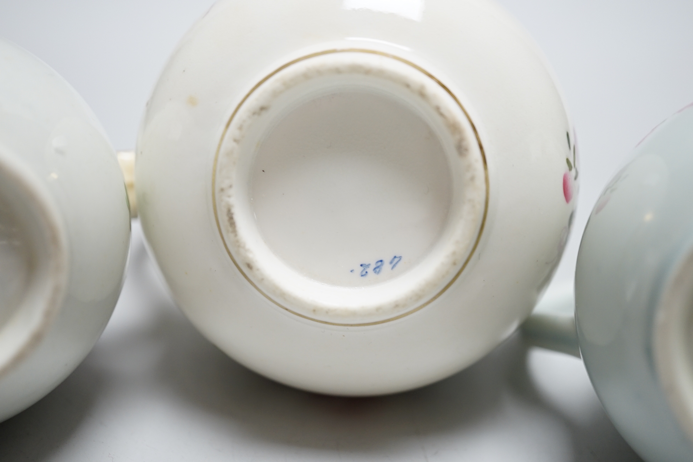 Two Worcester flower painted sparrow-beak jugs, c.1780 and an English porcelain milk jug, c.1825 (3)